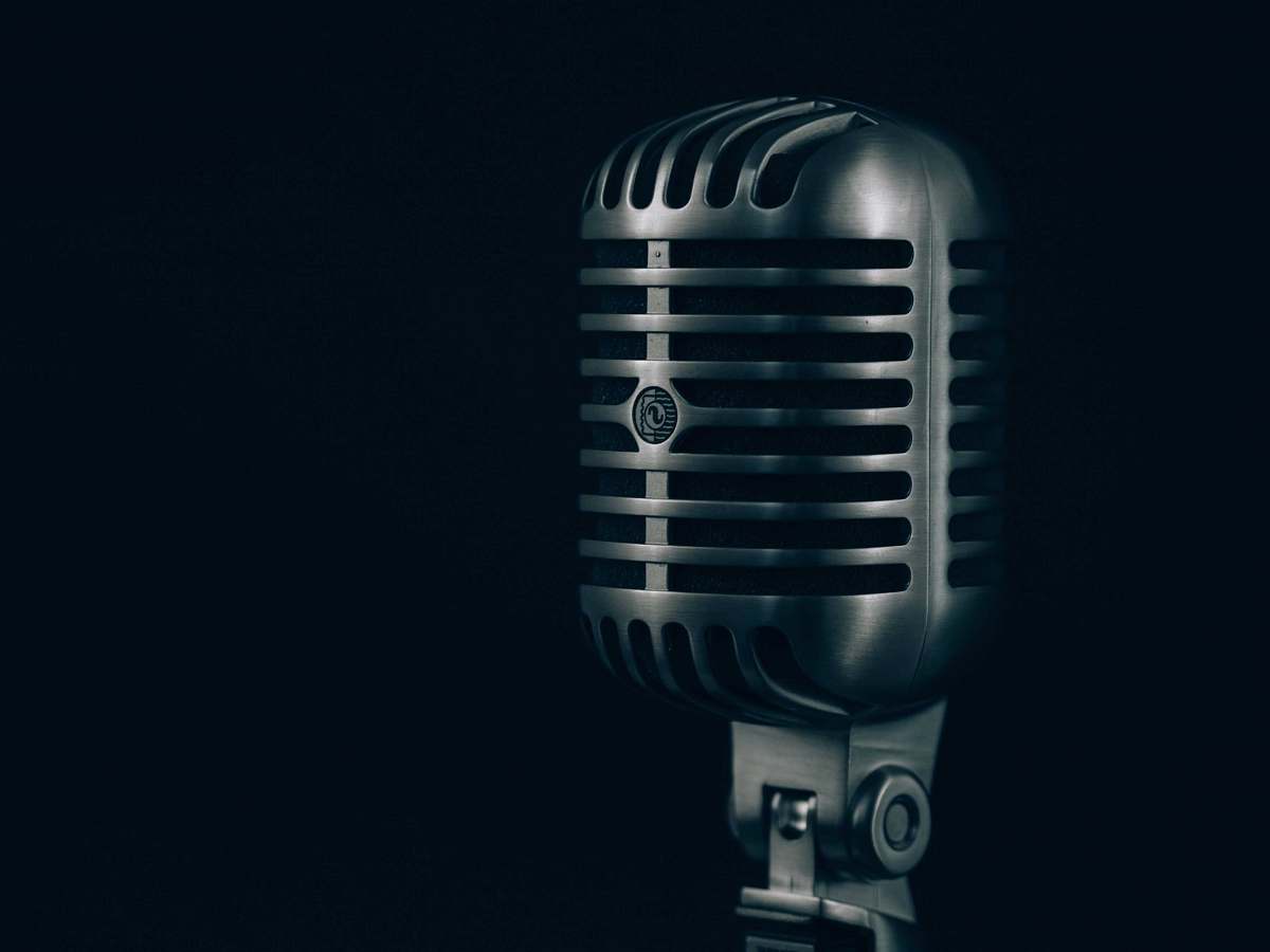 microphone shallow focus photography of condenser microphone metal