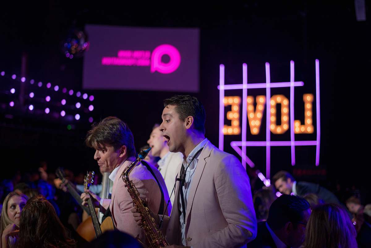 human three man band playing on stage at night person