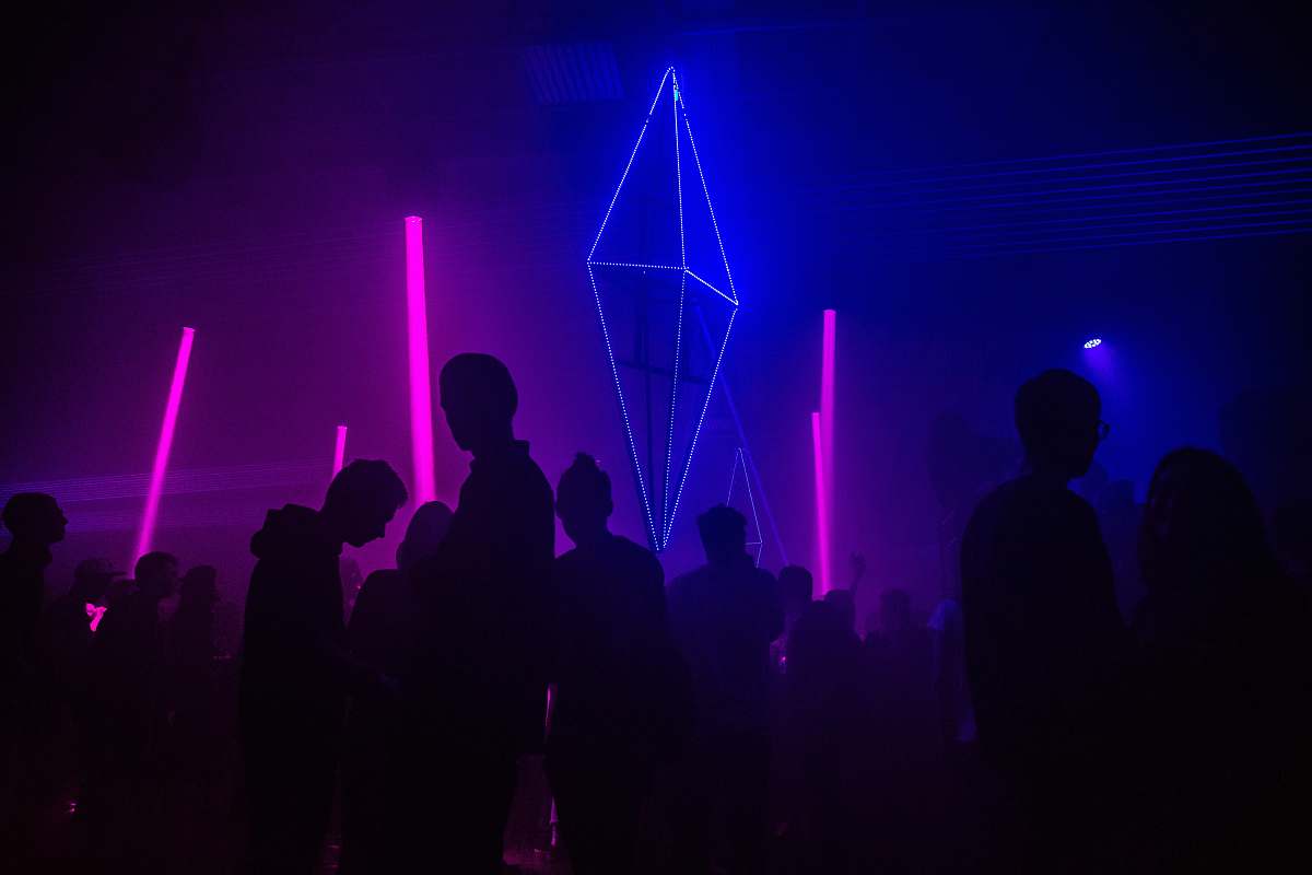 moscow silhouette photography of people gathered inside bar russia