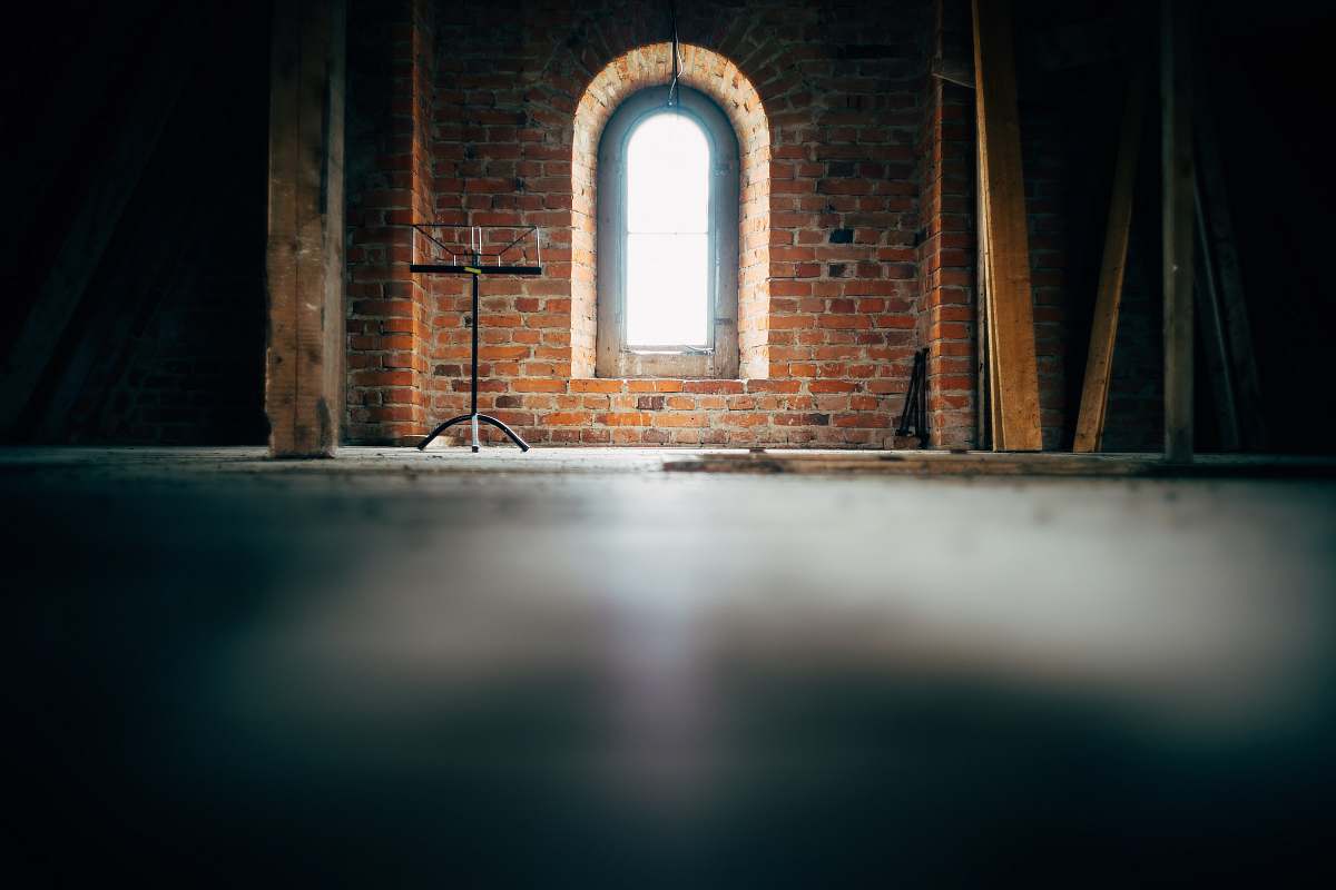 sweden low-angle photo of concrete wall and window arch