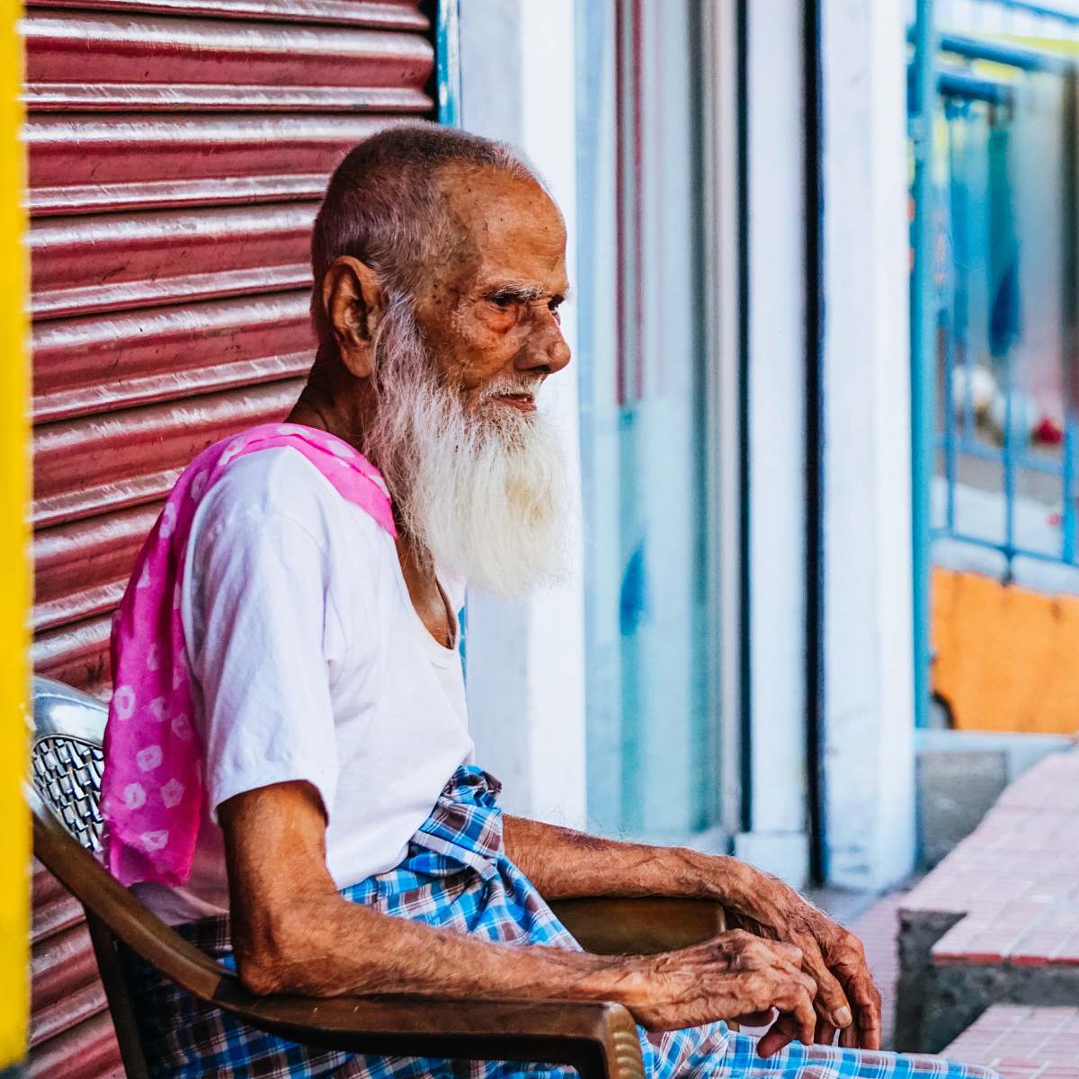 person man sitting on armchair during daytime human