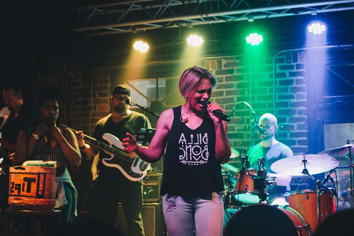 human female singer performing live people