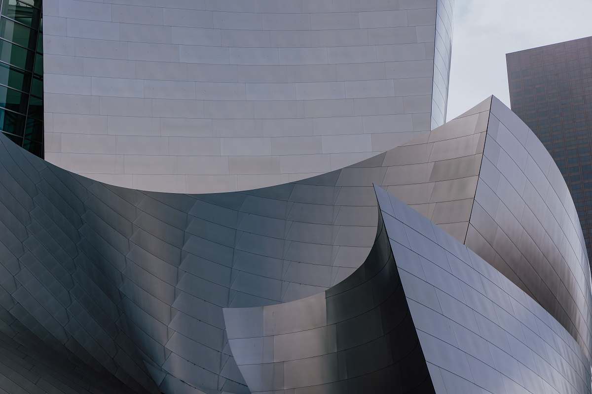 grey gray tiled building walt disney concert hall