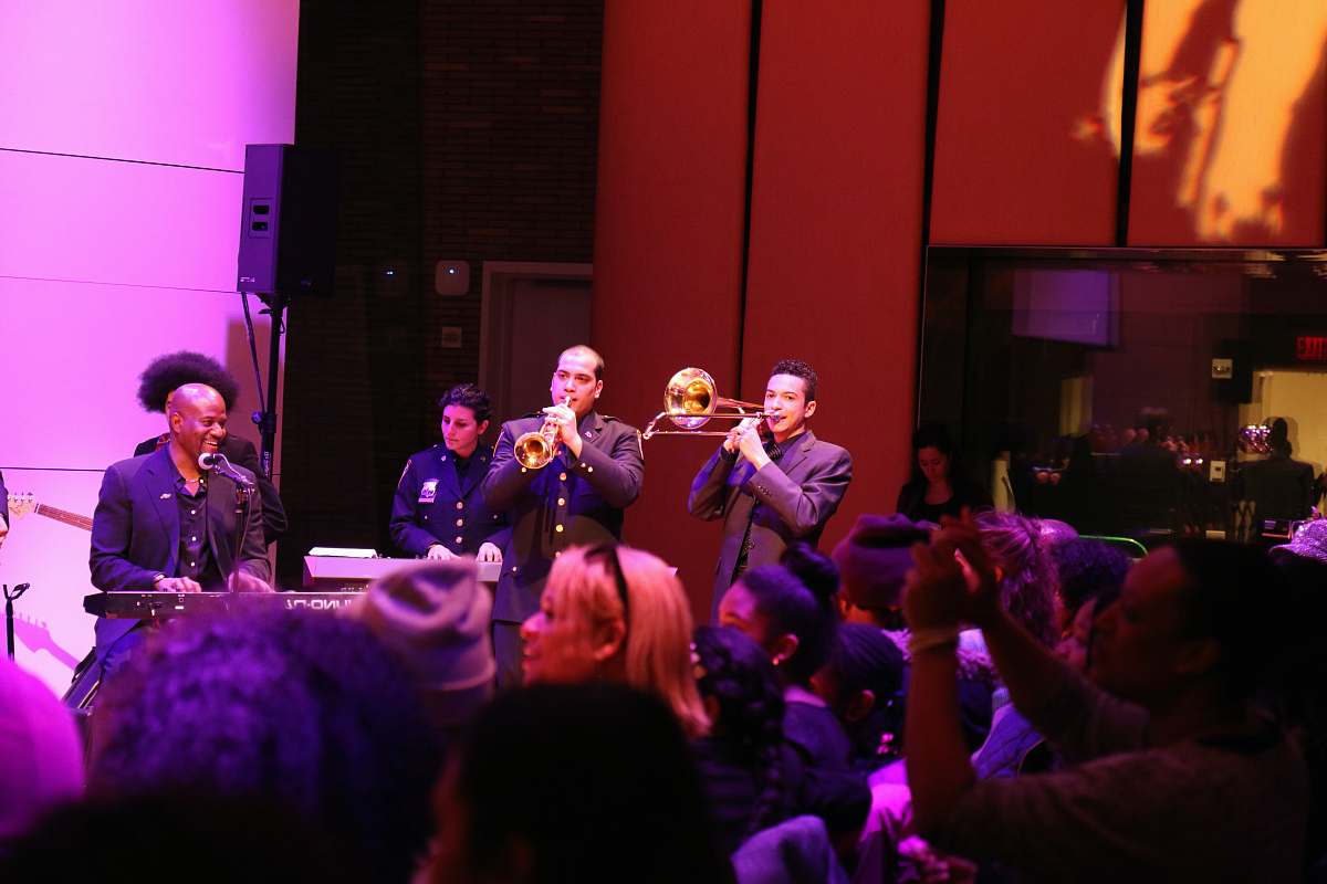 human group of men playing music instruments on stage people