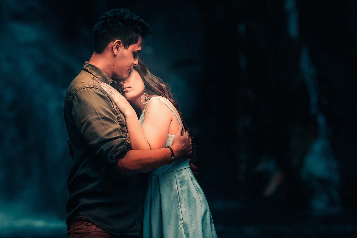 human man and woman hugging each other people