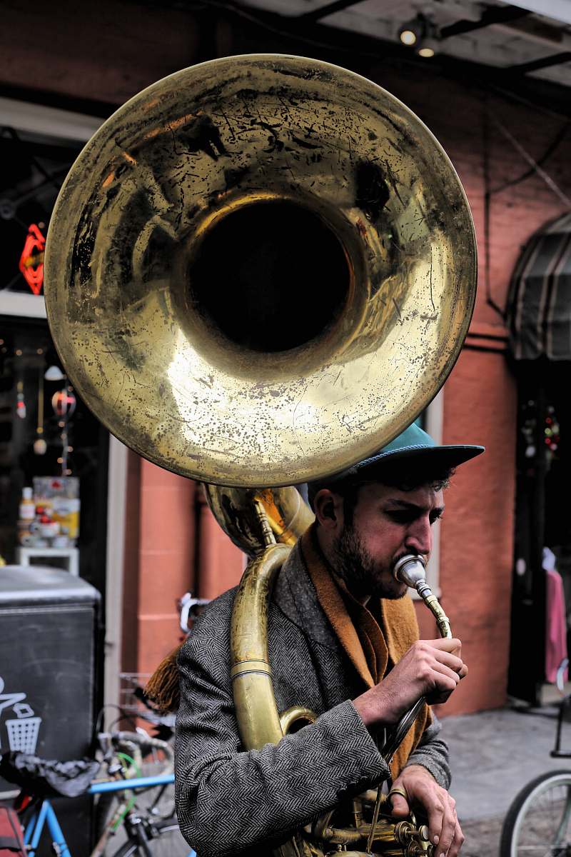 human man plying trombone people