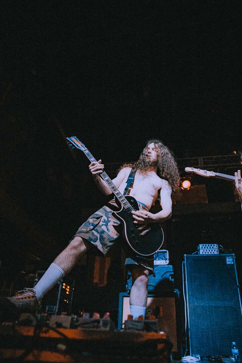 people photo of man playing guitar human