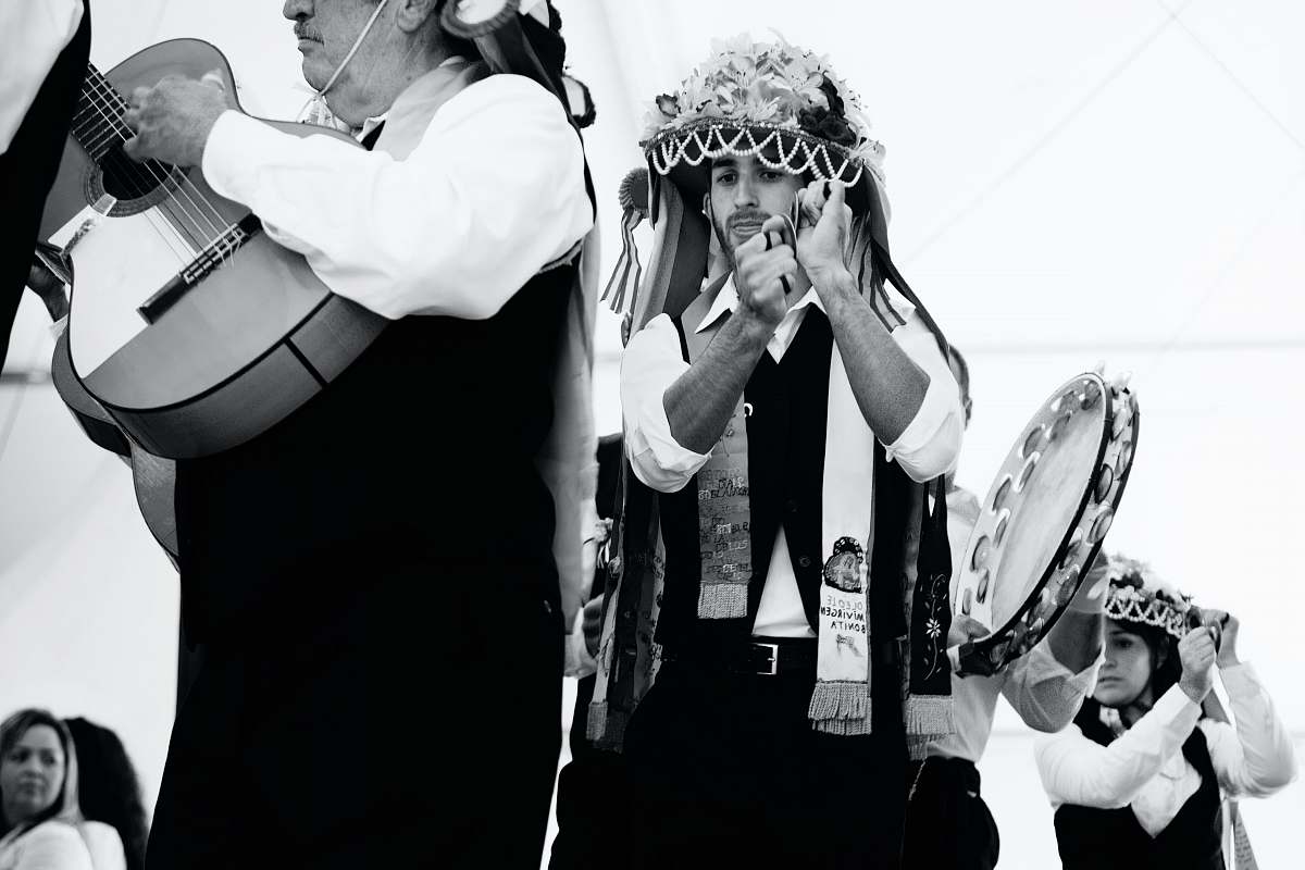 human three person playing musical instrument photo black-and-white