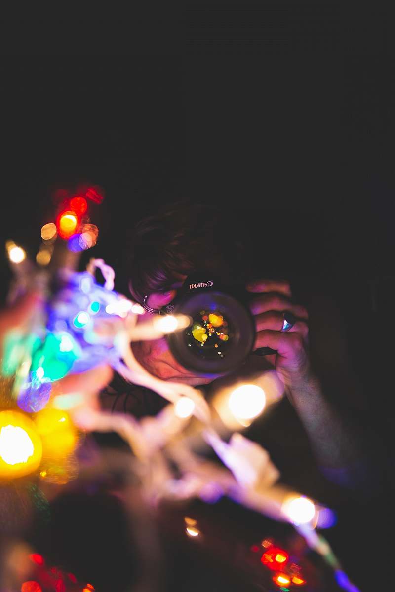 human woman taking bokeh effect photo people