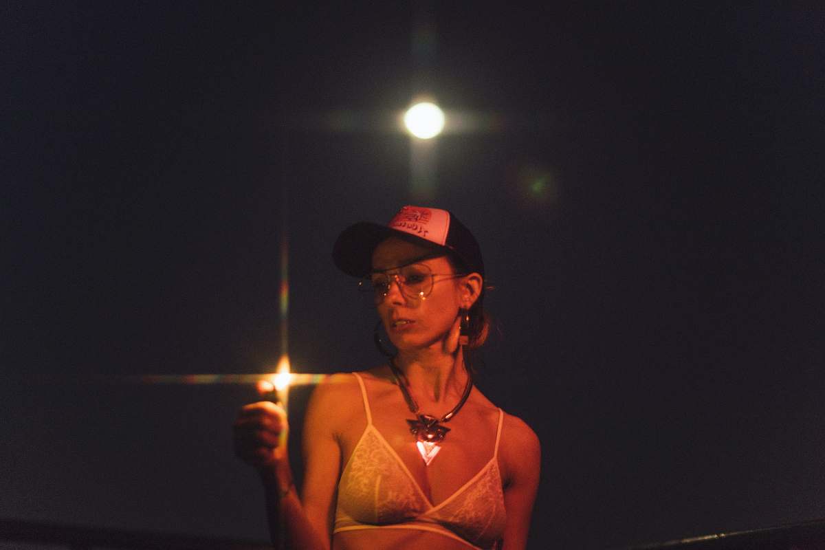 human woman wearing white bra and cap light