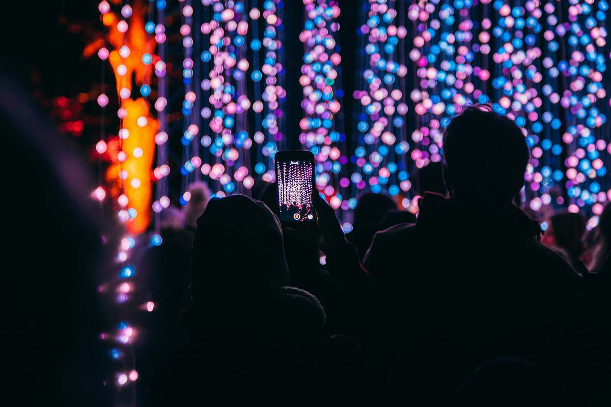 lighting bokeh photography of person taking picture at stage blenheim palace