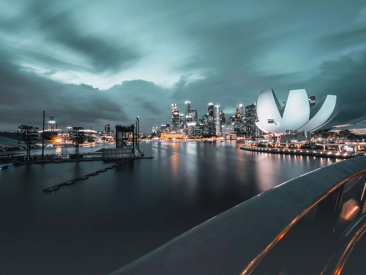 architecture time-lapse photo of buildings taken at nighttime brass section