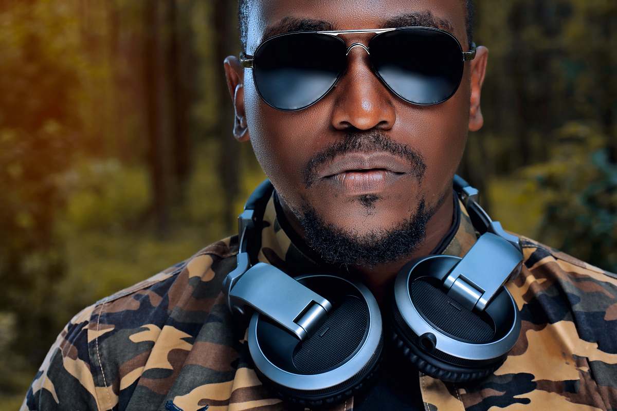 accessory man wearing sunglasses and grey and black headphones accessories