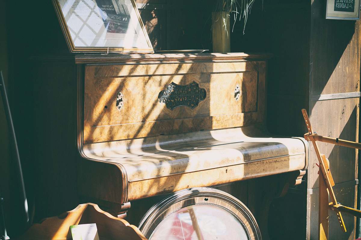 rochester brown wooden upright piano inside the room at daytime united kingdom