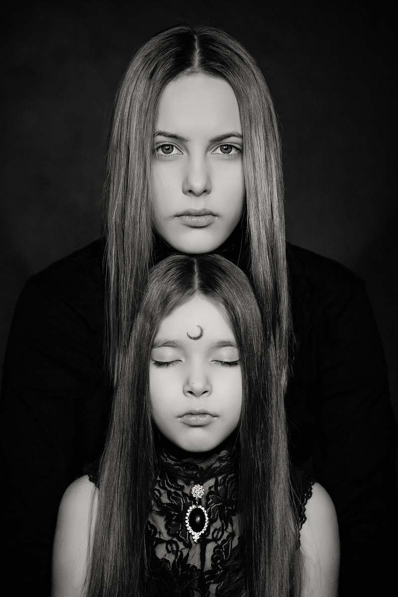person grayscale photography of two women people