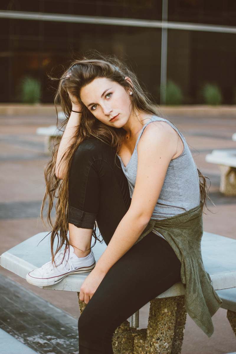 woman woman sitting on picnic table female