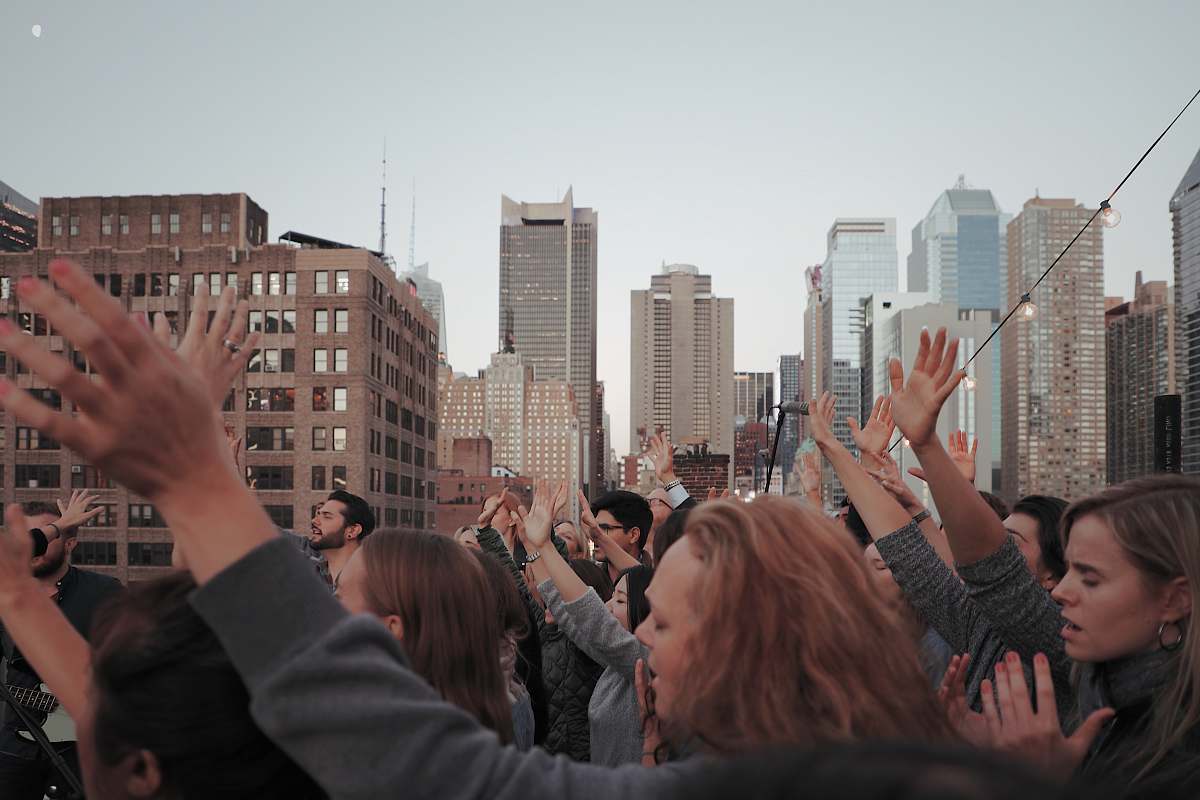 person group of people waving their hands human
