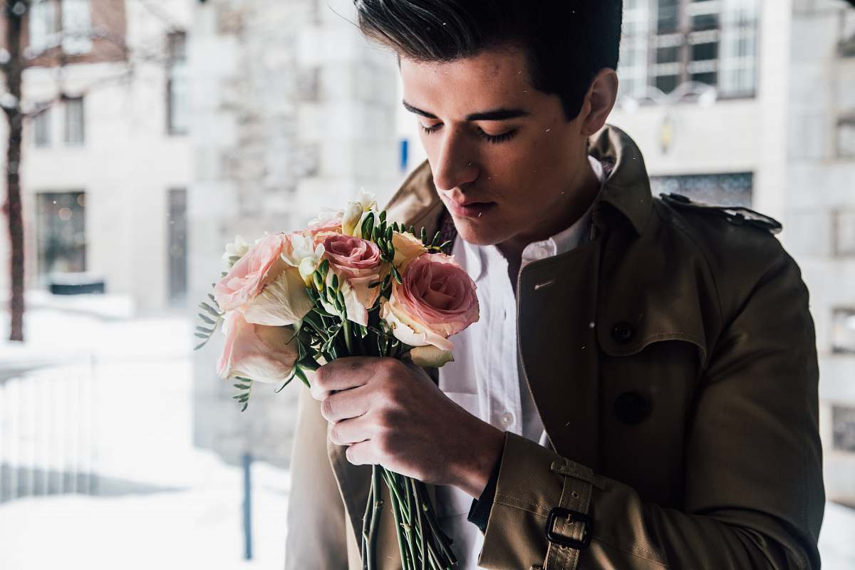 flower man holding pink roses male