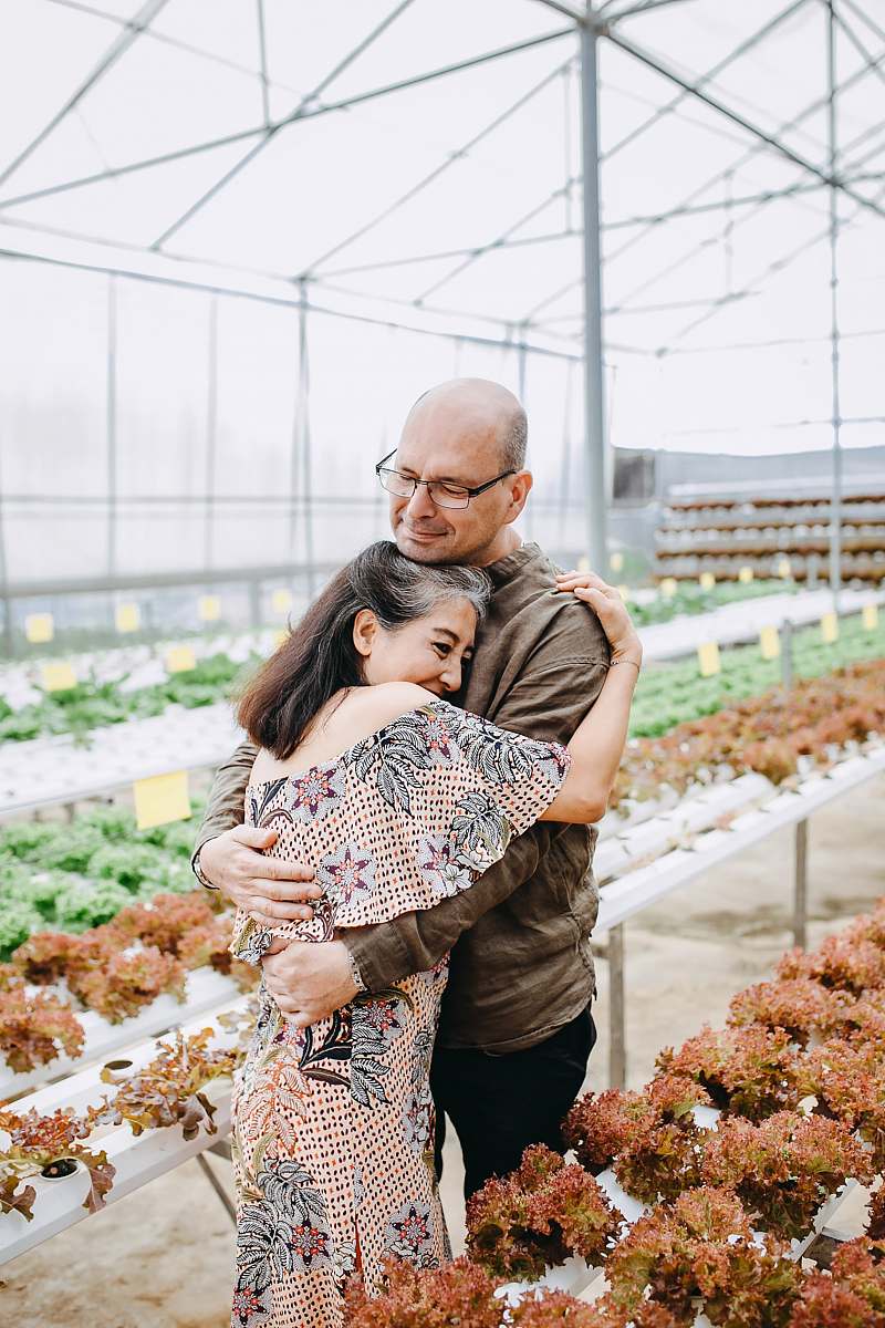 person man hugging woman inside garden house human
