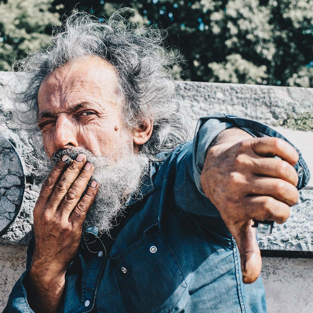 human man showing thumbs down person