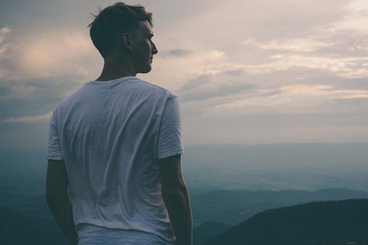 Person Man Standing Facing Mountains During Sunset Human Image Free Photo