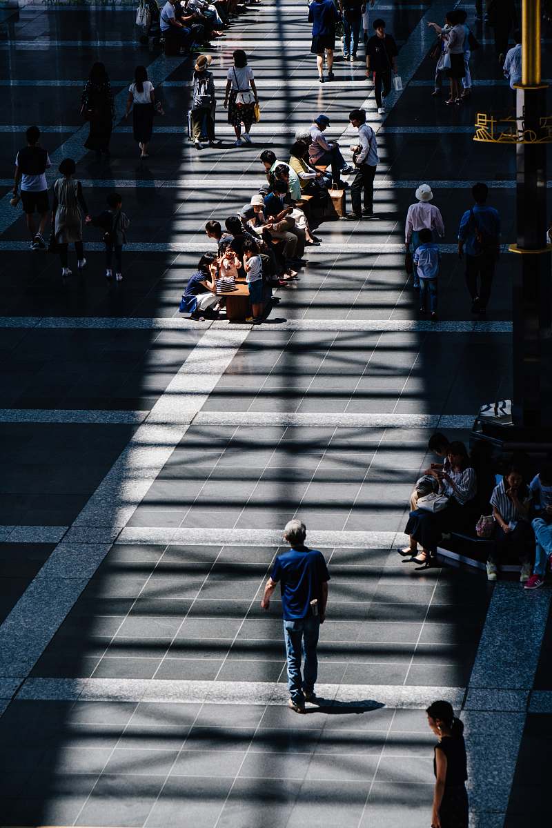 person man walking on road human