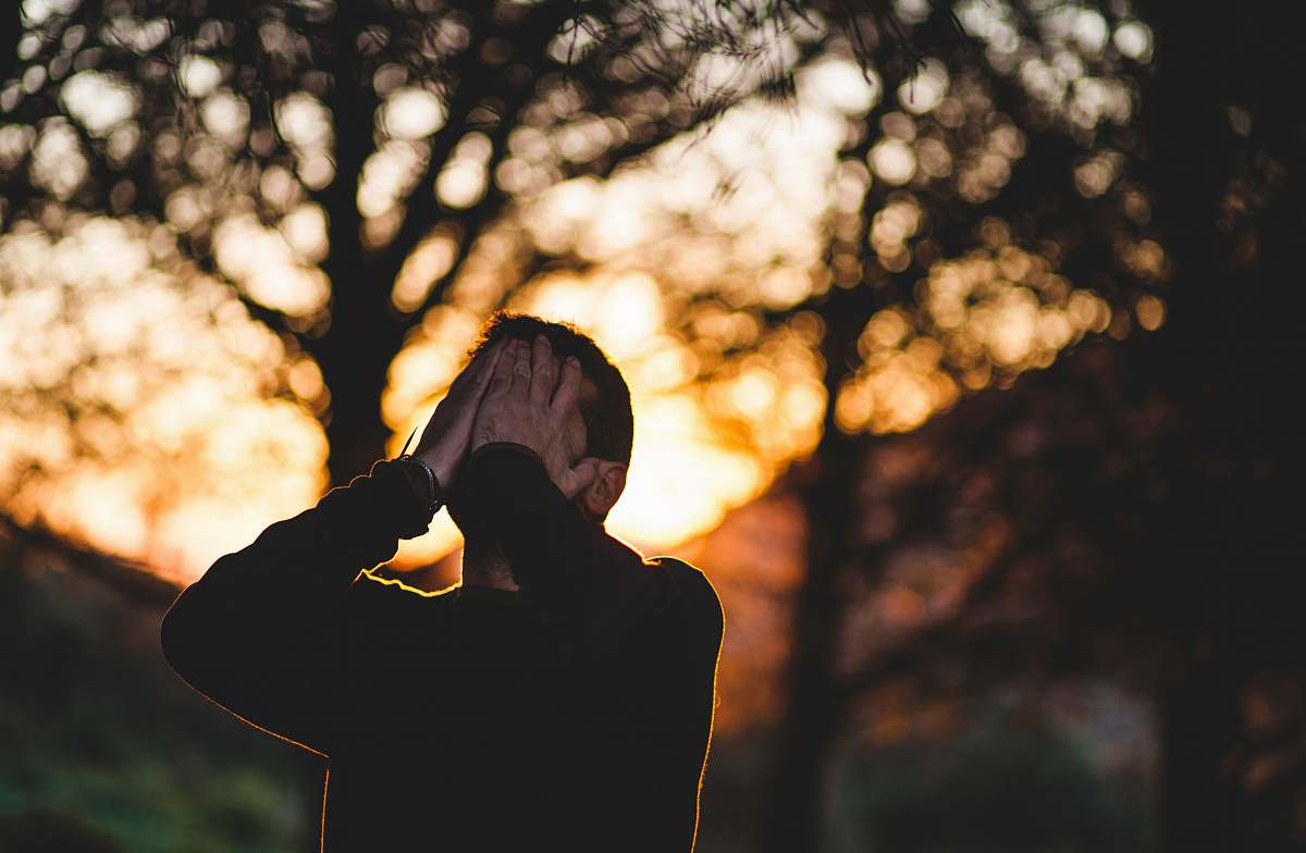 person man wearing black long-sleeved shirt human