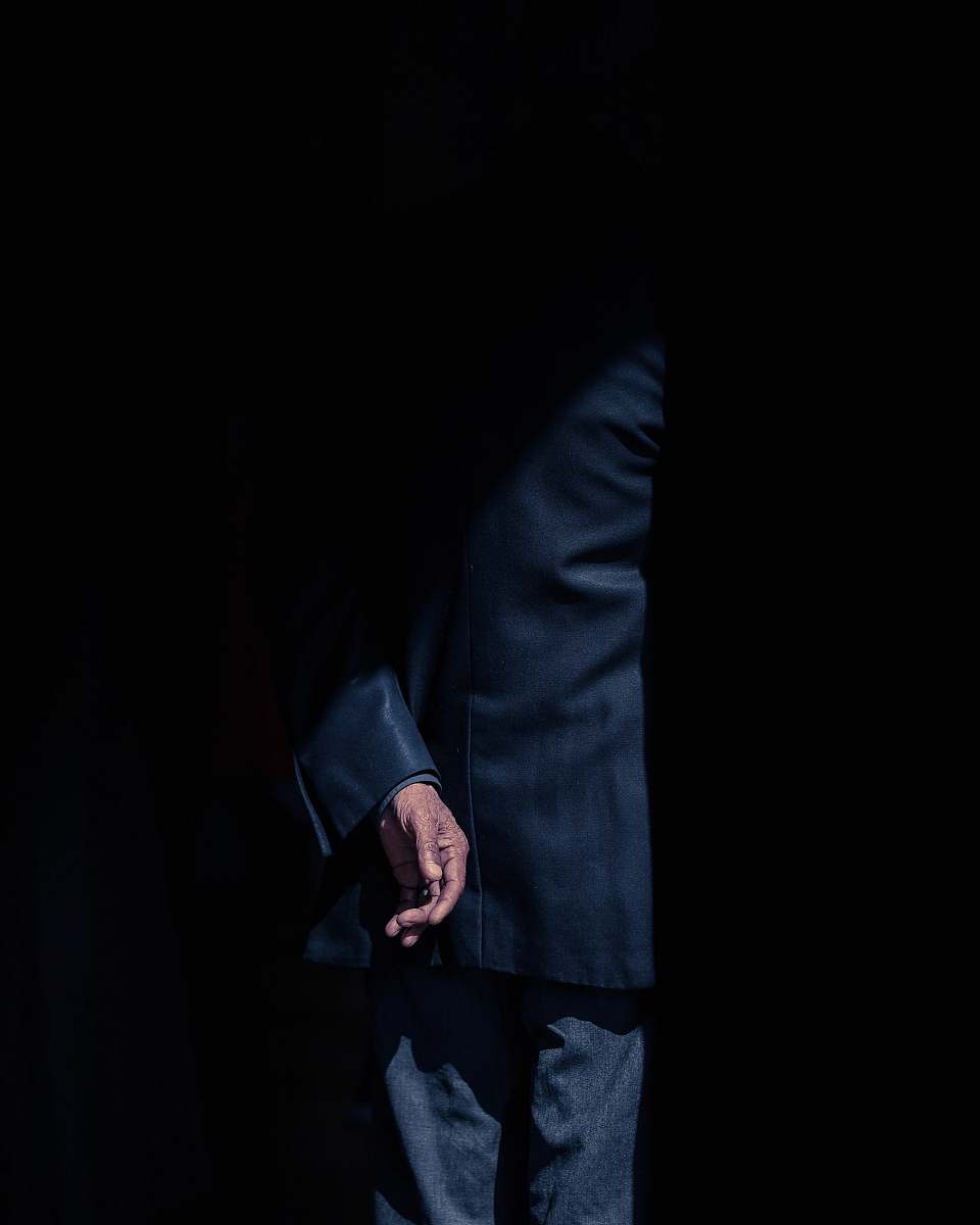 person man wearing black suit jacket human