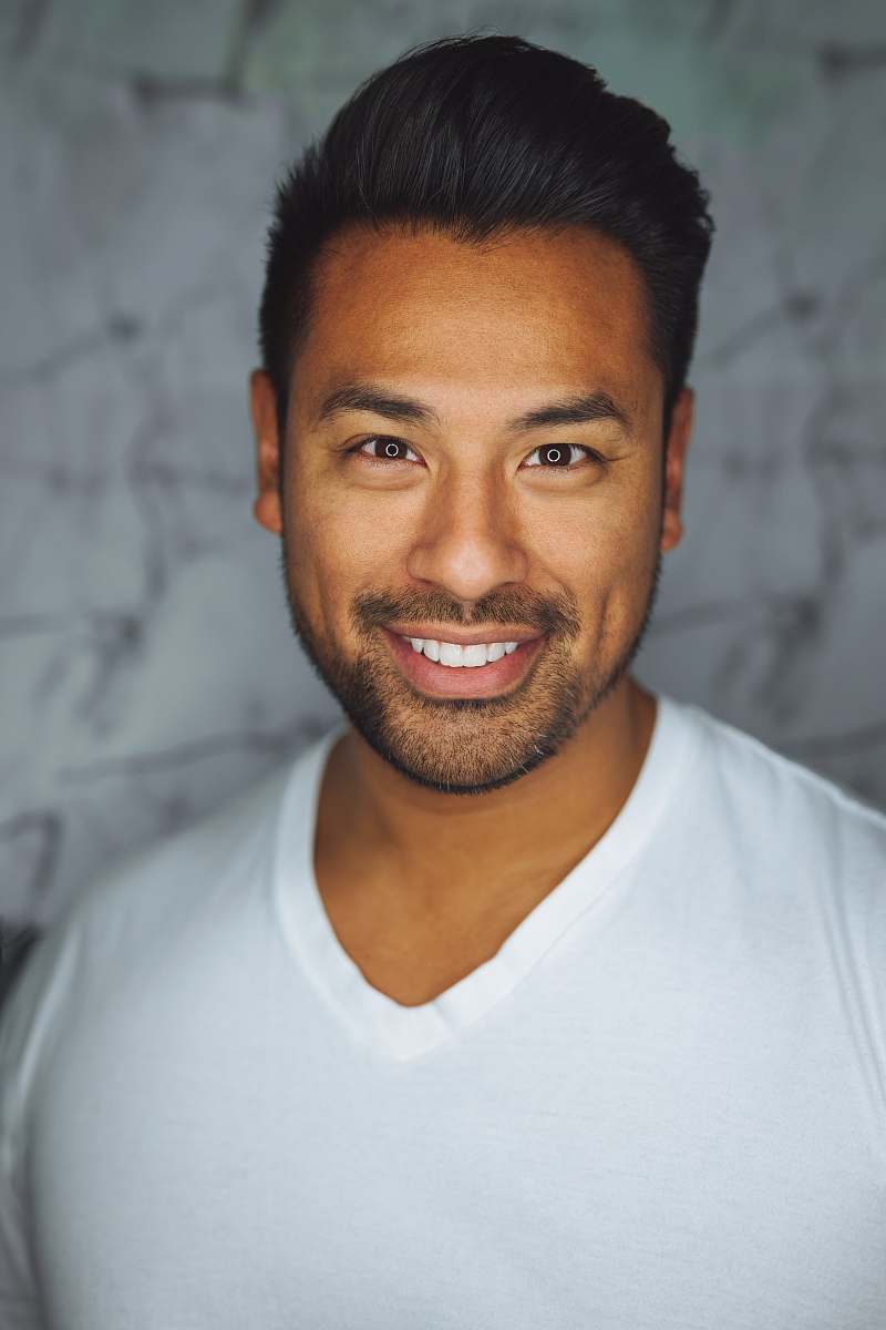 face man wearing white V-neck shirt human