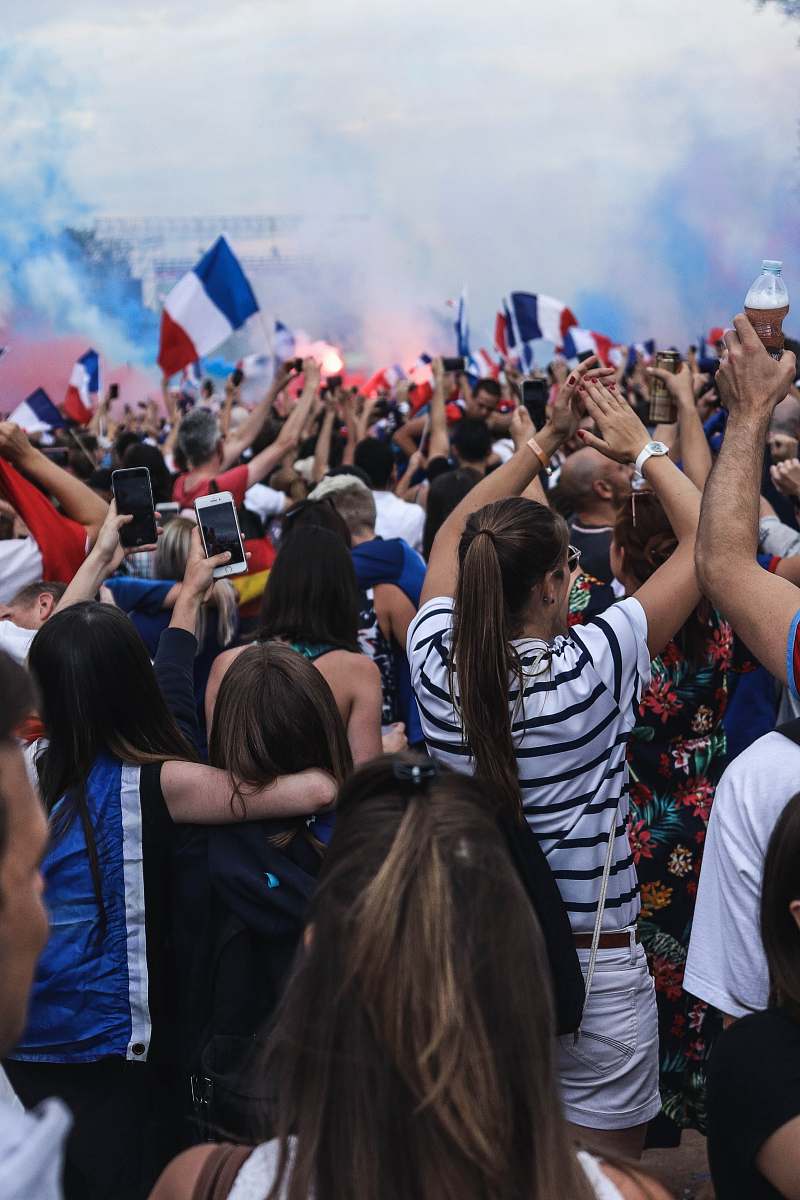 human people gathering holding France flags crowd
