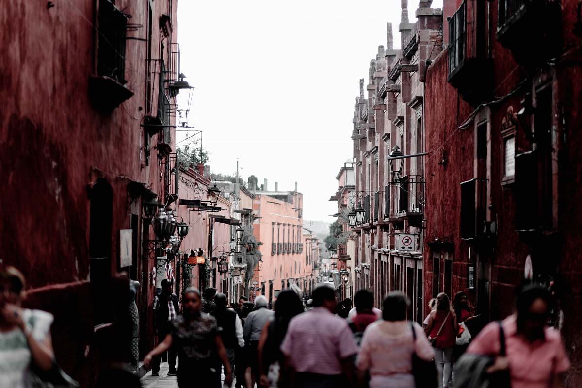 street people walking on street during daytime town