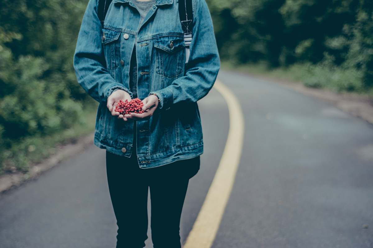 human person standing on a road person