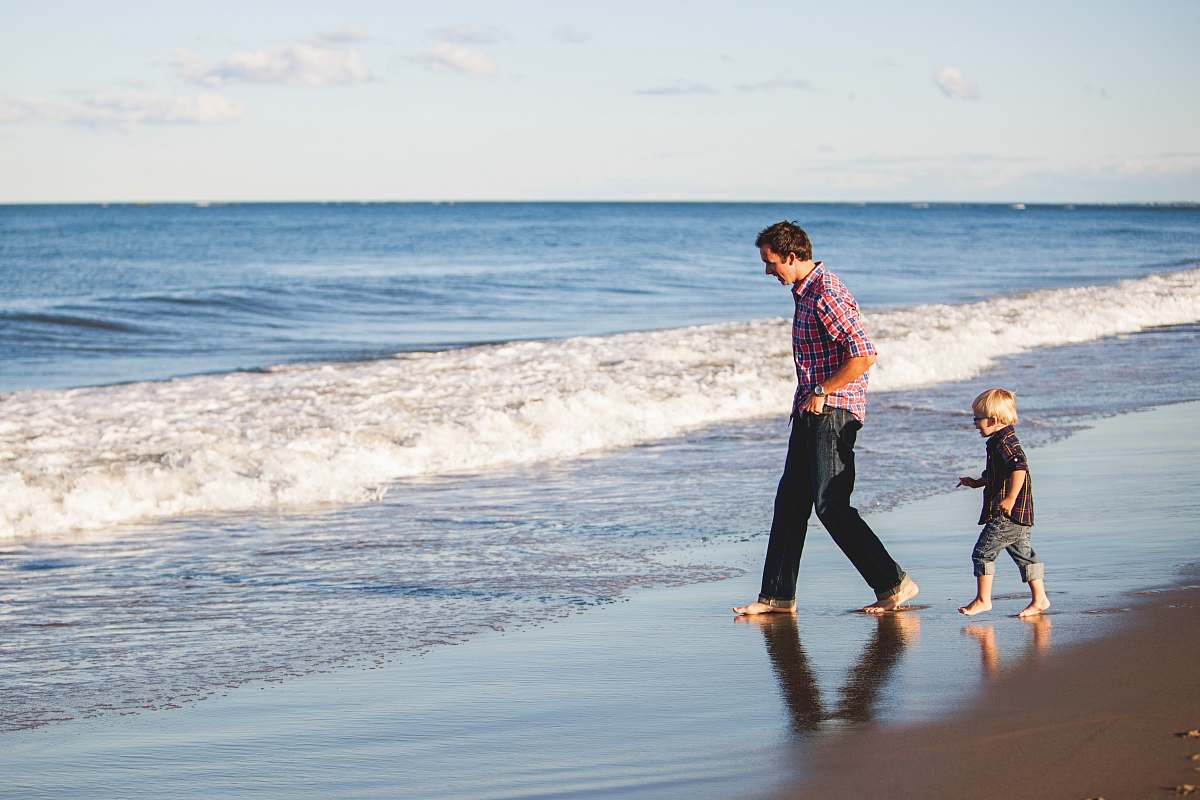 person person standing on seashore beach