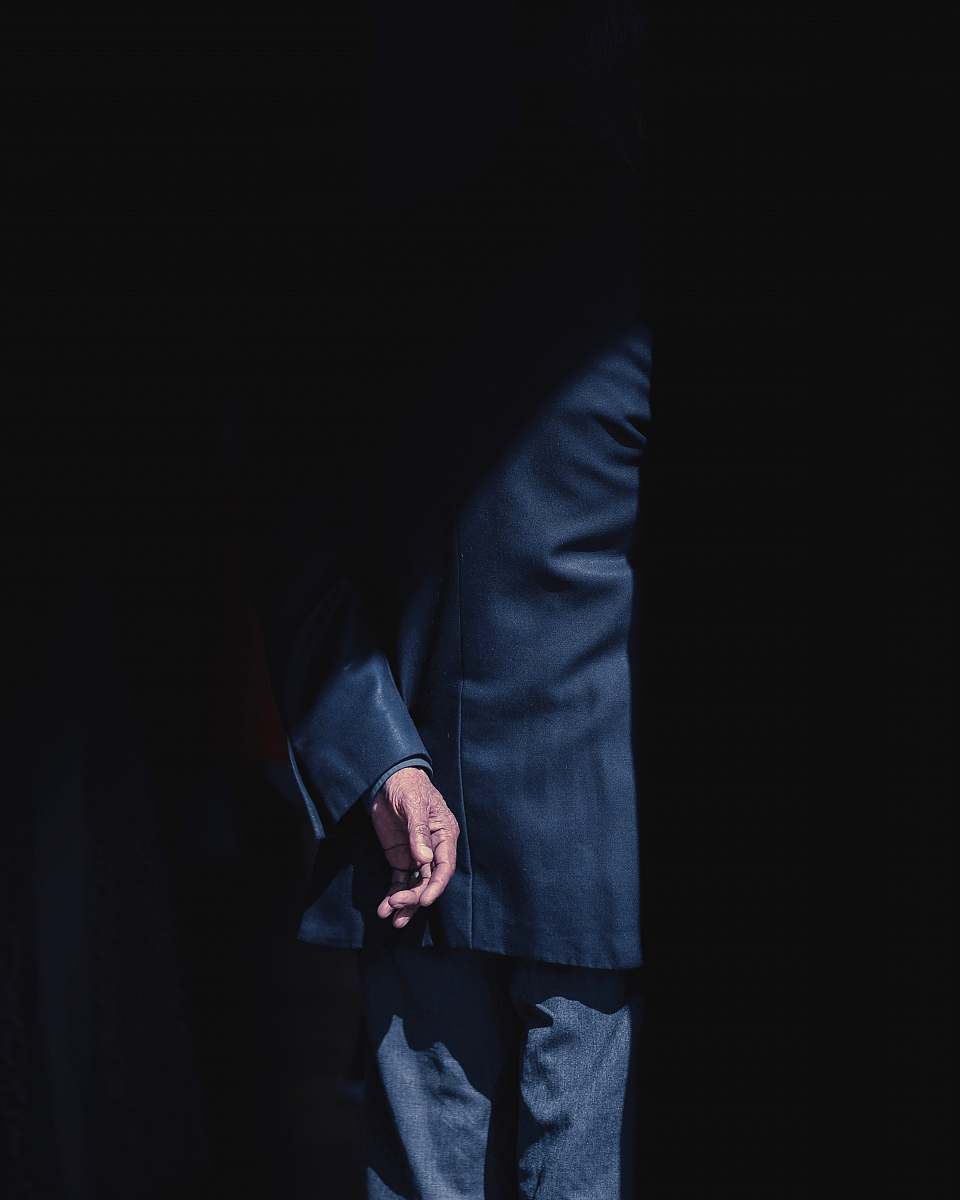 person person wearing black formal suit human