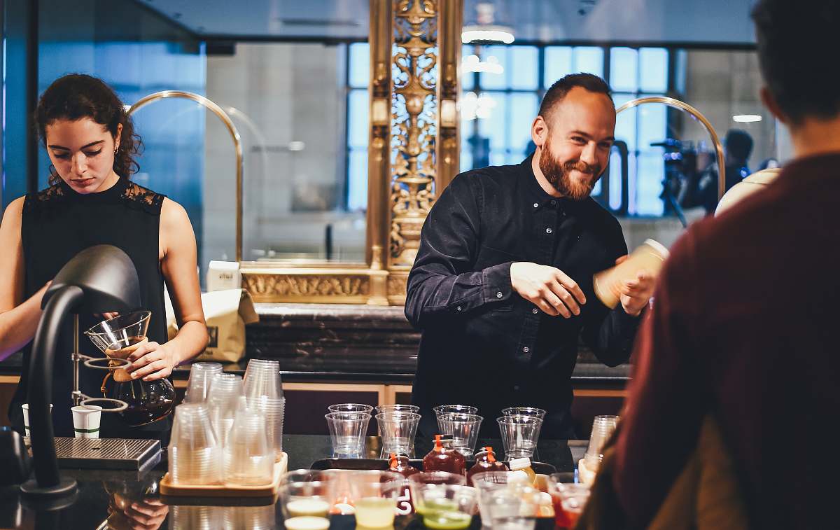 person photo of man and woman mixing beverages human