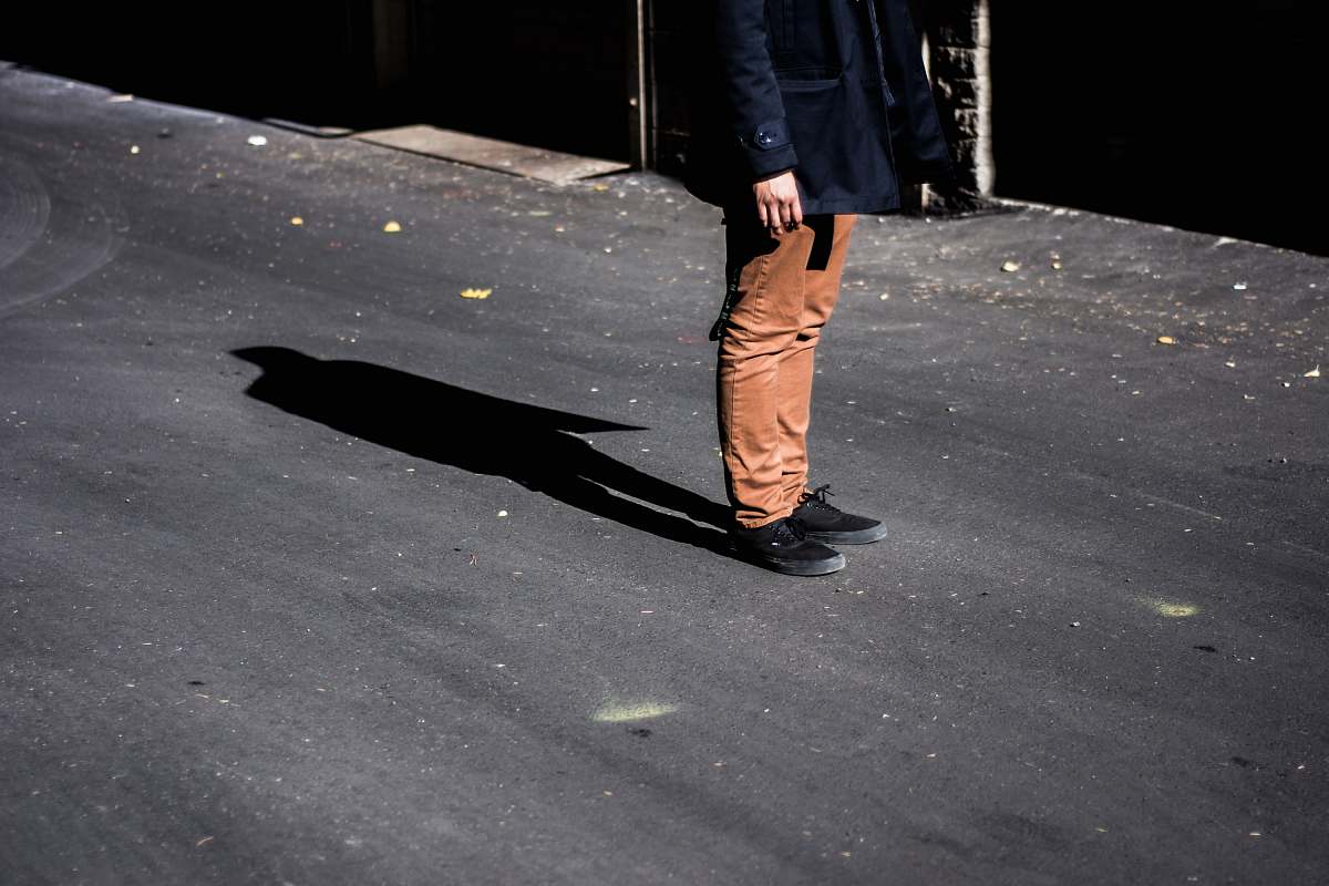 person photography of man wearing coat human