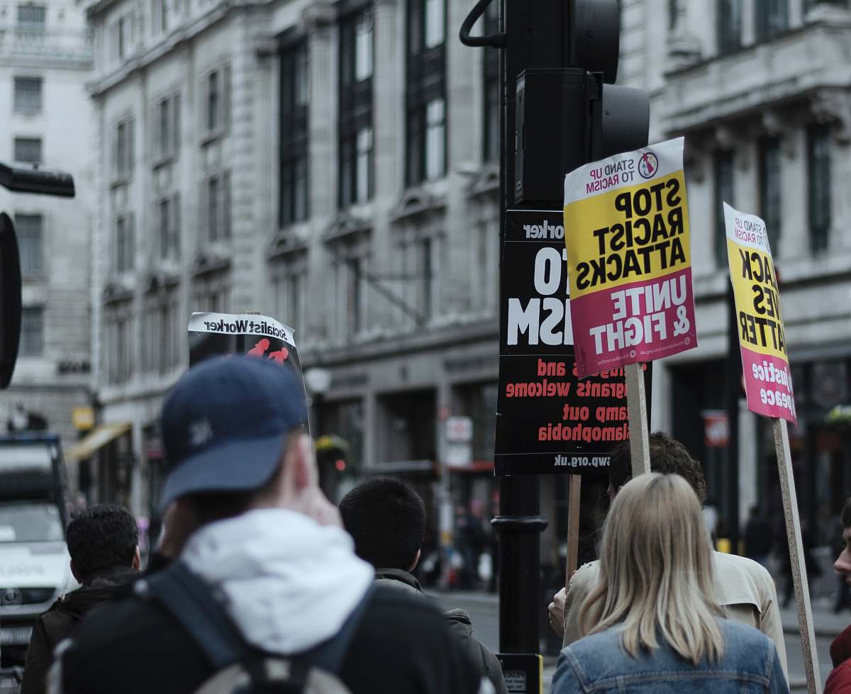 london shallow focus photo of protesting people protest