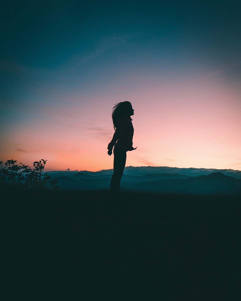 human silhouette of woman jumping silhouette