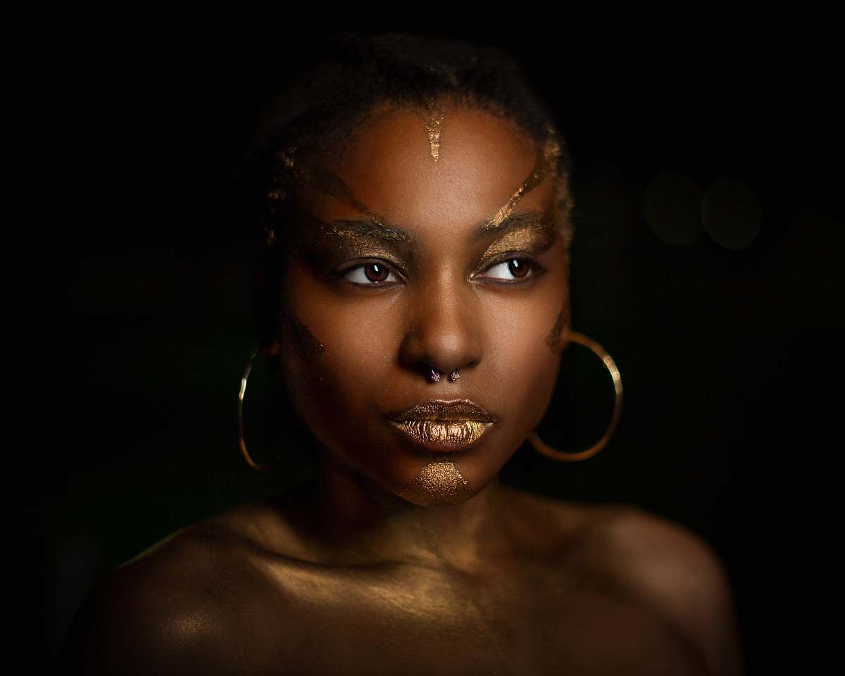 person topless woman wearing hoop earrings human
