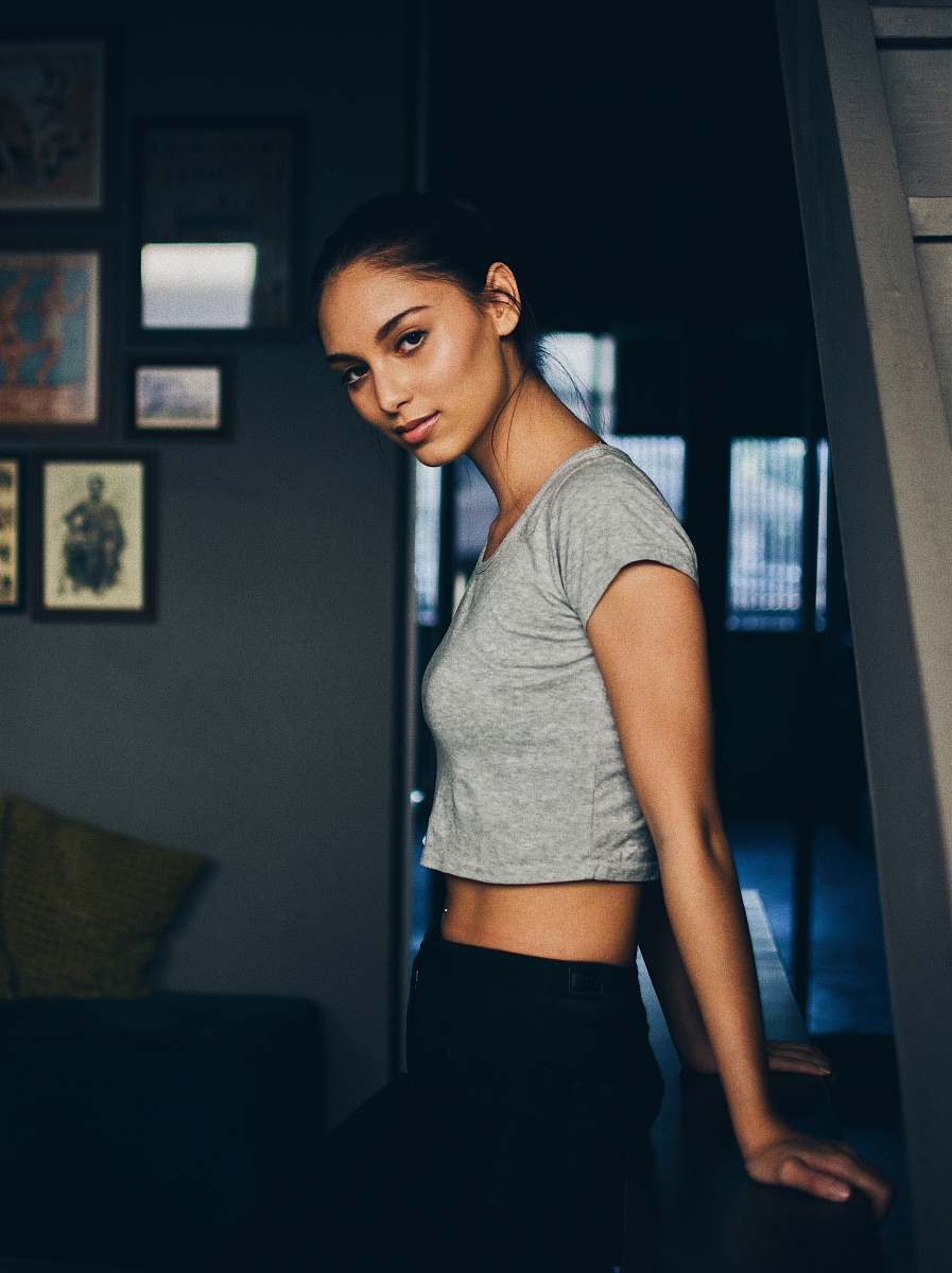 human woman holding table standing near door person