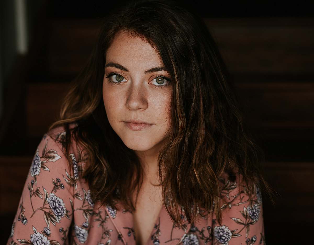 person woman in peach and white floral top human