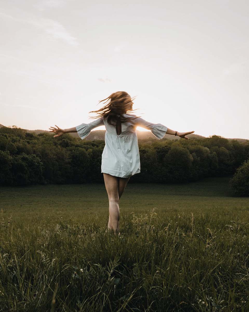 person woman open arm on grass human