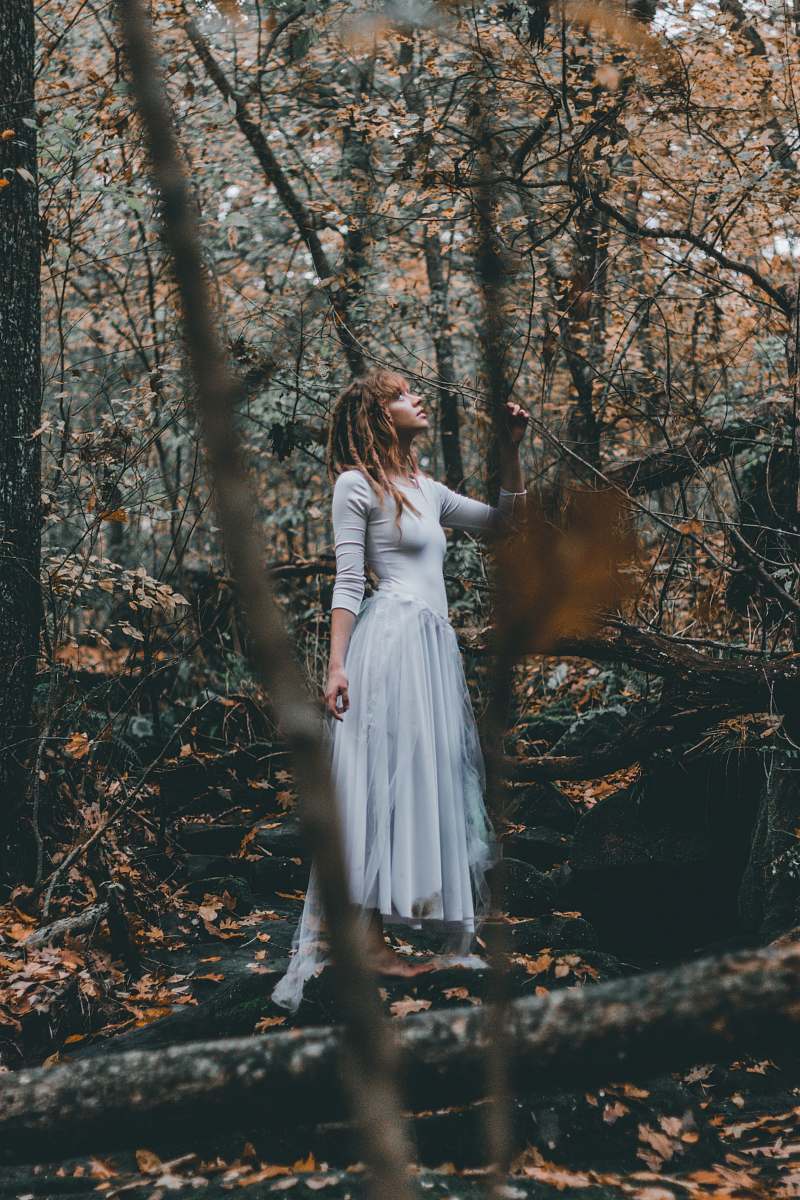 person woman standing on forest trees human
