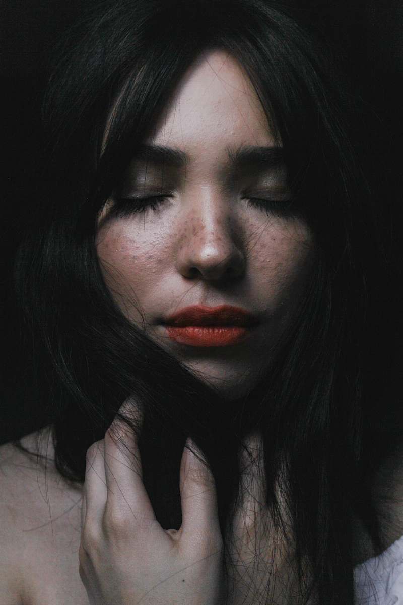 person woman touching her hair portrait