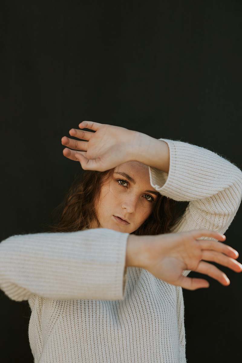 human woman wearing white corduroy long-sleeved shirt person