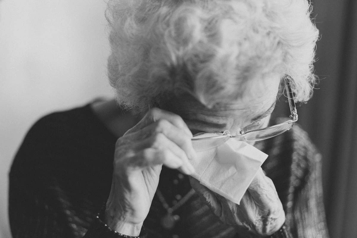 human woman wiping her eyes black-and-white