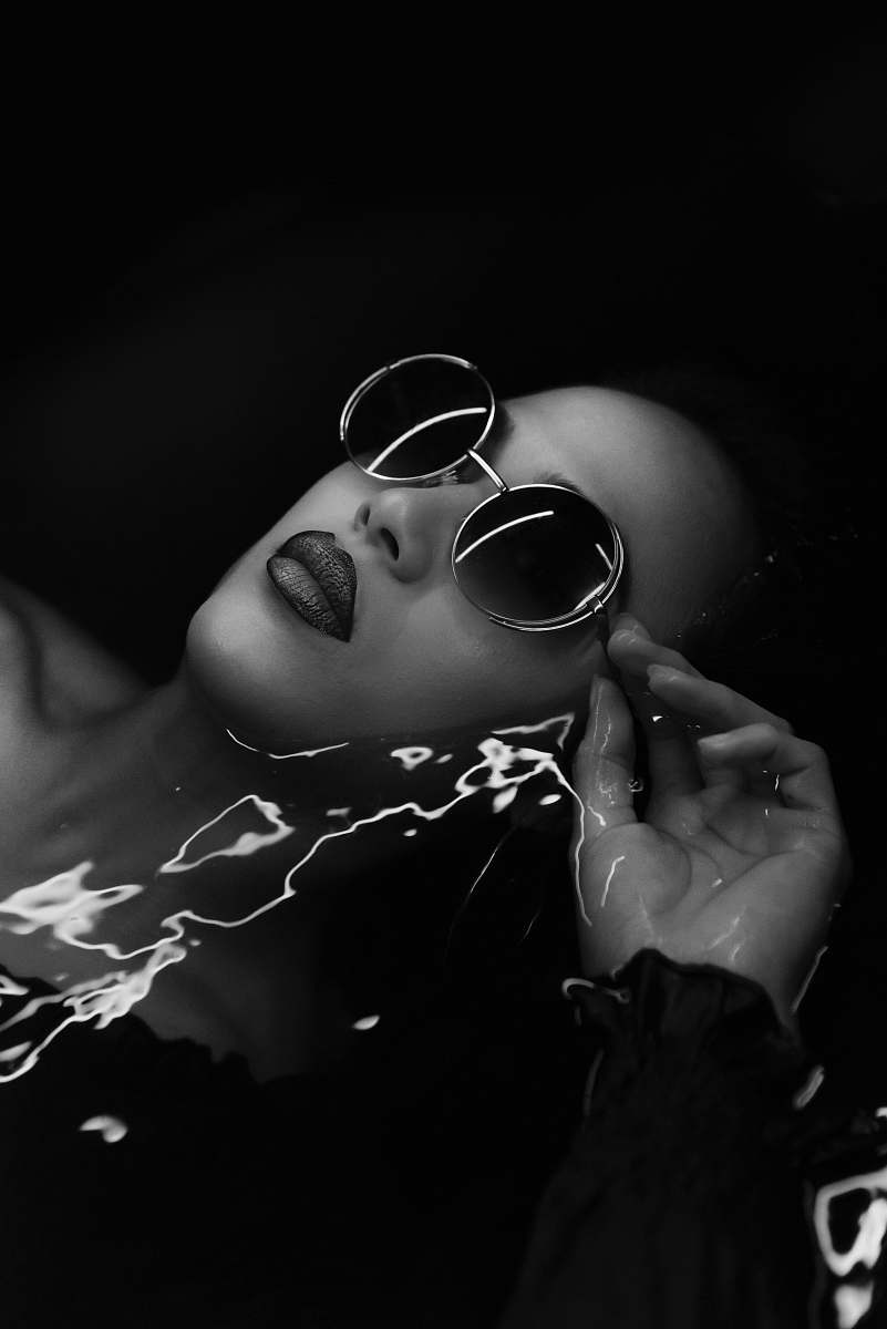 human woman's hippie style sunglasses black-and-white