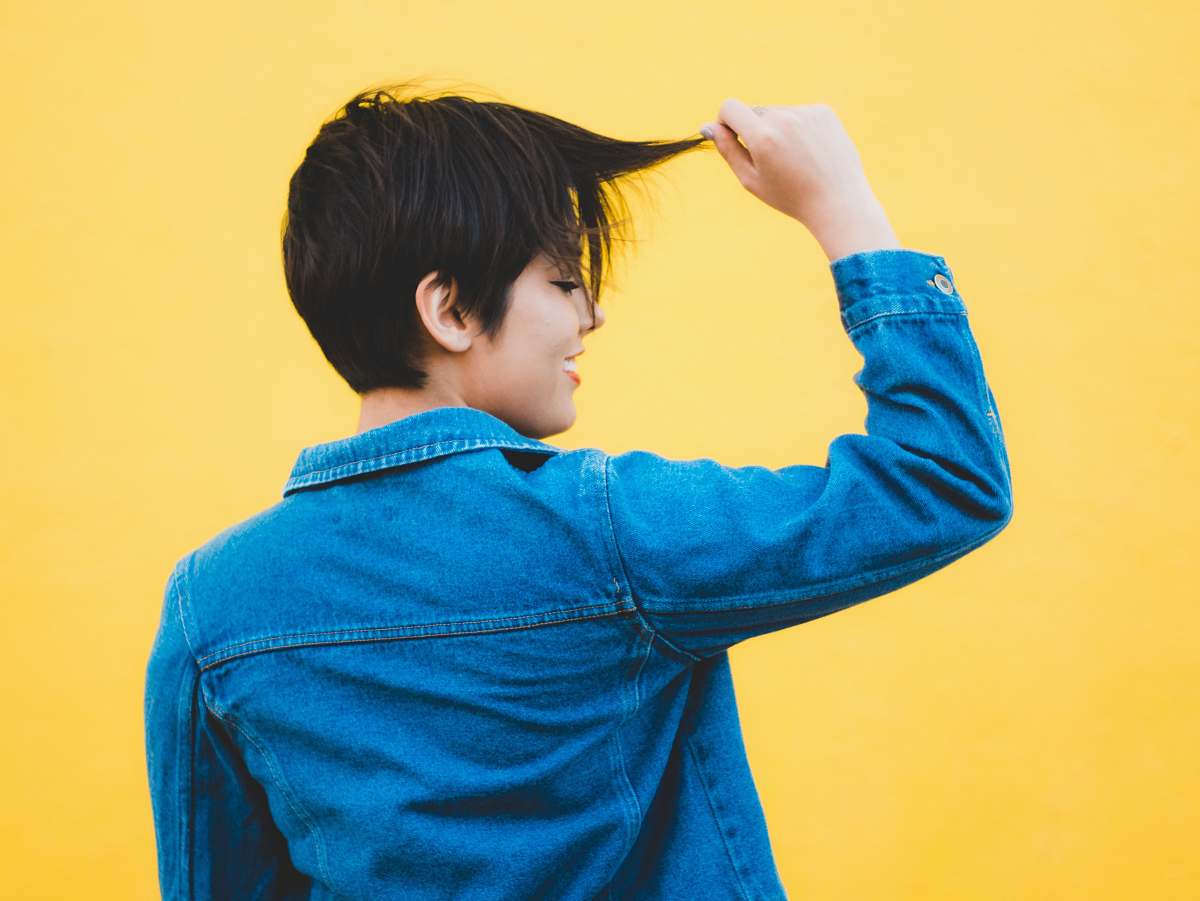 human women wearing blue denim jacket person
