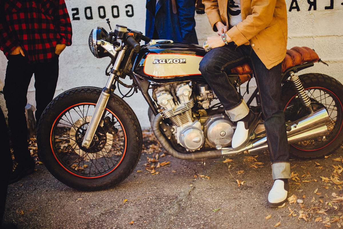 people black and gray Honda cafe racer bike