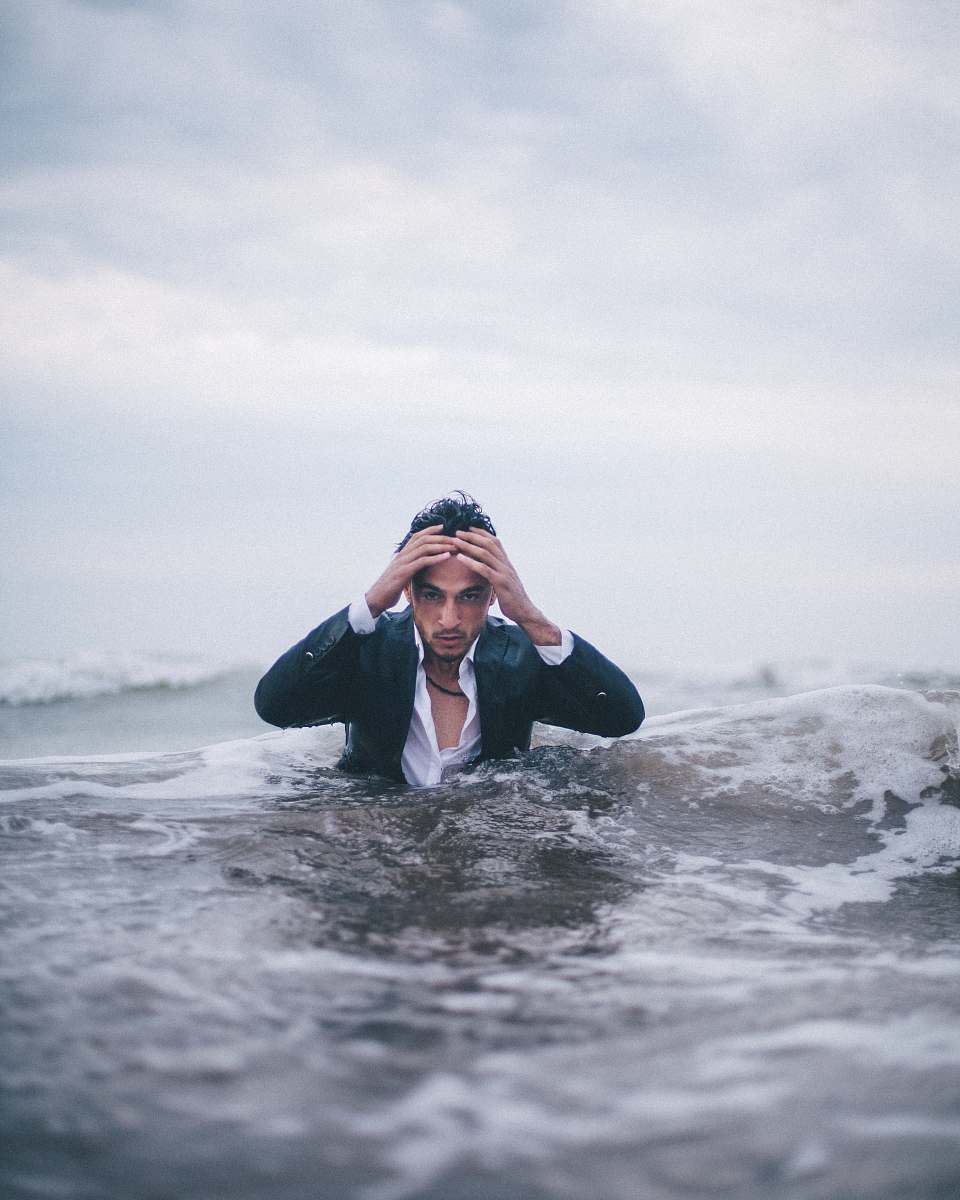 people man on body of water during daytime human